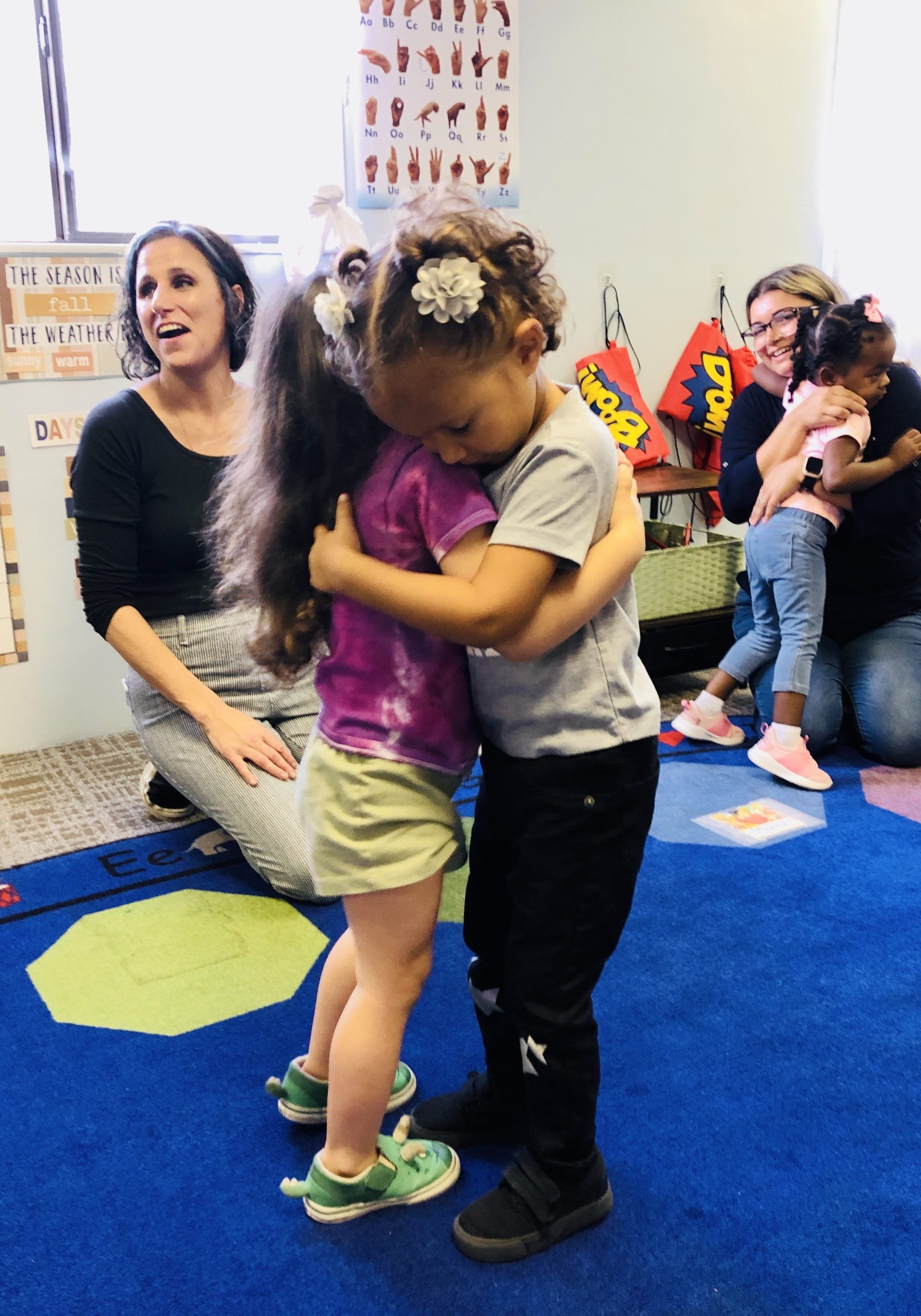 kids hugging at RSG in wildomar preschool